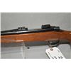 Image 4 : Remington Model 700 .350 Rem Mag Cal Bolt Action Rifle w/ 24" bbl [ blued finish, showing some wear 