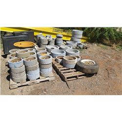 CONTENTS OF 4 PALLETS: USED MISC. MANLIFT WHEELS