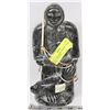 Image 1 : 10" SIGNED ESKIMO WITH SEAL STONE CARVING