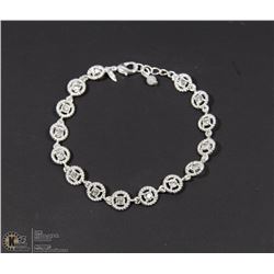 ENCHANTING SILVER TONE TENNIS BRACELET