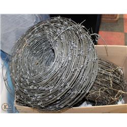 2 ROLLS OF BARBWIRE..**CAREFUL HANDLING IT**