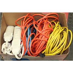 BOX OF POWER BARS AND EXTENSION CORDS