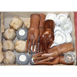 FLAT OF HAND CARVED HANDS AND TEAL LIGHTS