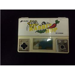 PALMTEX RABBIT HOP HAND HELD GAME (TRI SCREEN)