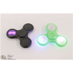 LOT OF TWO  LED LIGHT HAND SPINNERS