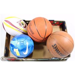 4 ASSORTED BALLS INCL RUGBY, SOCCER AND 2