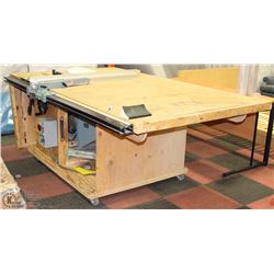 DELTA SHOP SAW WITH FEED TABLE AND CABINET ON