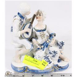 VINTAGE PORCELAIN FIGURINE