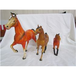 3 toy horses - 2 with tape on legs