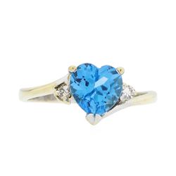 14KT Yellow Gold 1.50ct Blue Topaz and Diamond Ring