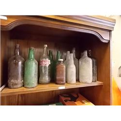 SHELF LOT OF COLLECTOR BOTTLES