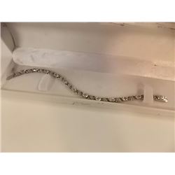 BRACELET - 12  OVAL FACETTED WHITE TOPAZ & DIAMONDS IN STERLING SILVER INFINITY LINK SETTING - ESTIM