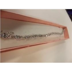 BRACELET - OVAL FACETED BLUE TOPAZ (13) & DIAMOND IN STERLING SILVER INFINITY LINK DESIGNED SETTING 