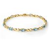 Image 1 : 2.76 CTW Blue Topaz & Diamond Bracelet 10K Yellow Gold - REF-28M2F - 12913