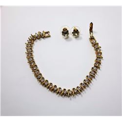 #20 - GOLD TONE WHITE TOPAZ TENNIS BRACELET