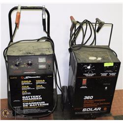 35) 2 BATTERY CHARGER/BOOSTER PACKS INCL