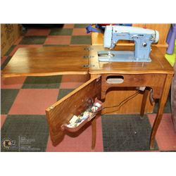 DOMESTIC SEWING MACHINE WITH ACCESSORY BOX AND