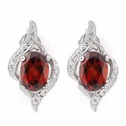EARRINGS - 1 3/4 CTW OVAL FACETED GARNETS & 4 DIAMONDS IN 925 STERLING SILVER SETTING - RETAIL ESTIM