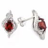 Image 2 : EARRINGS - 1 3/4 CTW OVAL FACETED GARNETS & 4 DIAMONDS IN 925 STERLING SILVER SETTING - RETAIL ESTIM