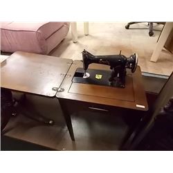 EMPIRE VINTAGE ELECTRIC SEWING MACHINE IN CABINET
