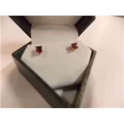 EARRINGS - GARNET IN 10K WHITE GOLD STUD DESIGNED SETTING - RETAIL ESTIMATE $150