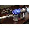 Image 2 : DYSON HANDHELD DC35 WITH CHARGER AND ACCESSORIES WORKING