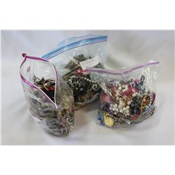 THREE LARGE BAGS OF JEWELLRY