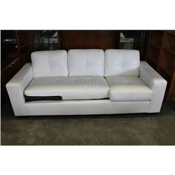 NEW WHITE LEATHER HOME ELEGANCE SOFA, WITH MISMATCHED CUSHION