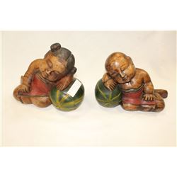 TWO CARVED BUDDHAS