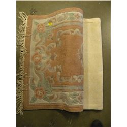 ROSE COLOURED FRINGE WOOL THROW RUG