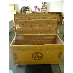 LARGE CARVED CEDAR LINED TRUNK WITH ELK MOTIFF