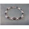 Image 1 : **** FEATURE ITEMS**** BRACELET - 34.5 CTW (9) OVAL FACETED MYSTIC TOPAZ IN STERLING SILVER SETTING 