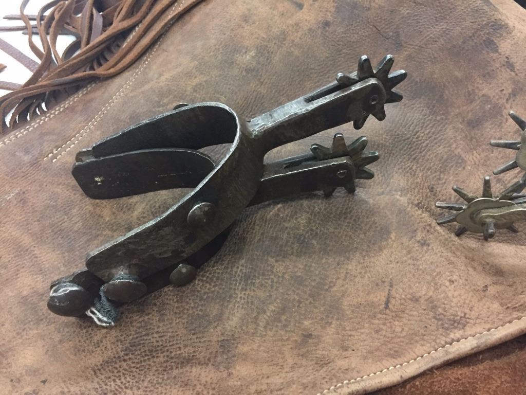 Two Pair Spurs And Leather Chaps
