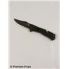 Image 1 : Red Cooper (Karl Urban) Movie Props