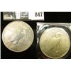 Image 2 : Pair of 1922 P U.S. Peace Silver Dollars, EF-AU, one with C.O.A. from the American Historical Societ