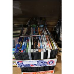 FOUR TRAYS OF DVDS APPROX. 140