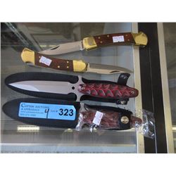 2 New Folding Knives & 2 Five Inch Daggers