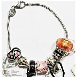#25 -7 ST.SILVER PERSONA & BLACK BEADS W/BRACELET