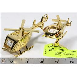 PAIR OF HELICOPTER CLOCKS - NEED BATTERIES