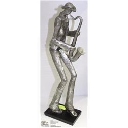 VINTAGE FIGURINE OF MAN PLAYING SAXOPHONE -