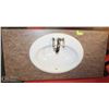 Image 1 : PORCELAIN VANITY WITH TAPS