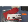 Image 8 : Tesla Memorabilia: Bag, Roadster 2 Manual, Promotional Materials, etc.
