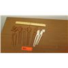 Image 1 : 7pc Hawaiian Hair Picks: 5 Wood, 2 White