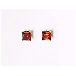 EARRINGS - GARNET IN 10K WHITE GOLD STUD DESIGNED SETTING - RETAIL ESTIMATE $150