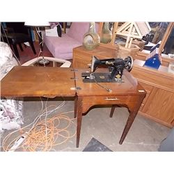 EMPIRE VINTAGE ELECTRIC SEWING MACHINE IN CABINET