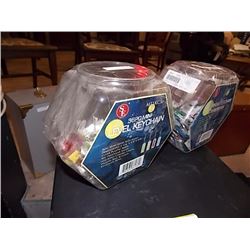 BIN OF NEW LEVEL KEY CHAINS