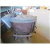Image 1 : Cast iron wood burning stove with tools