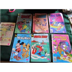 7 Whitmans comics - Bugs bunny,Tweety & Sylvester, The Road Runner,Super Goof,Huey Dewy,Louie,Tod an