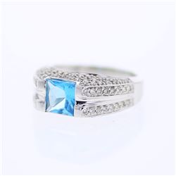 18KT White Gold 2.01ct Blue Topaz and Diamond Ring