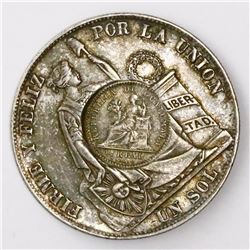 Guatemala, 1 peso, "1/2 real" counterstamp of 1894 on a Lima, Peru, 1 sol, 1882BF.